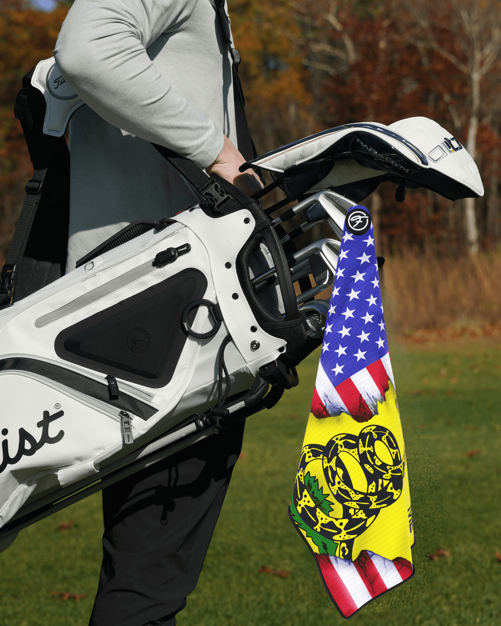 Flag Magnetic Golf Towel with USA Donβt Tread On Me Magnetic Golf Towel design attached to a golf bag. #color_usa-dont-tread-on-me