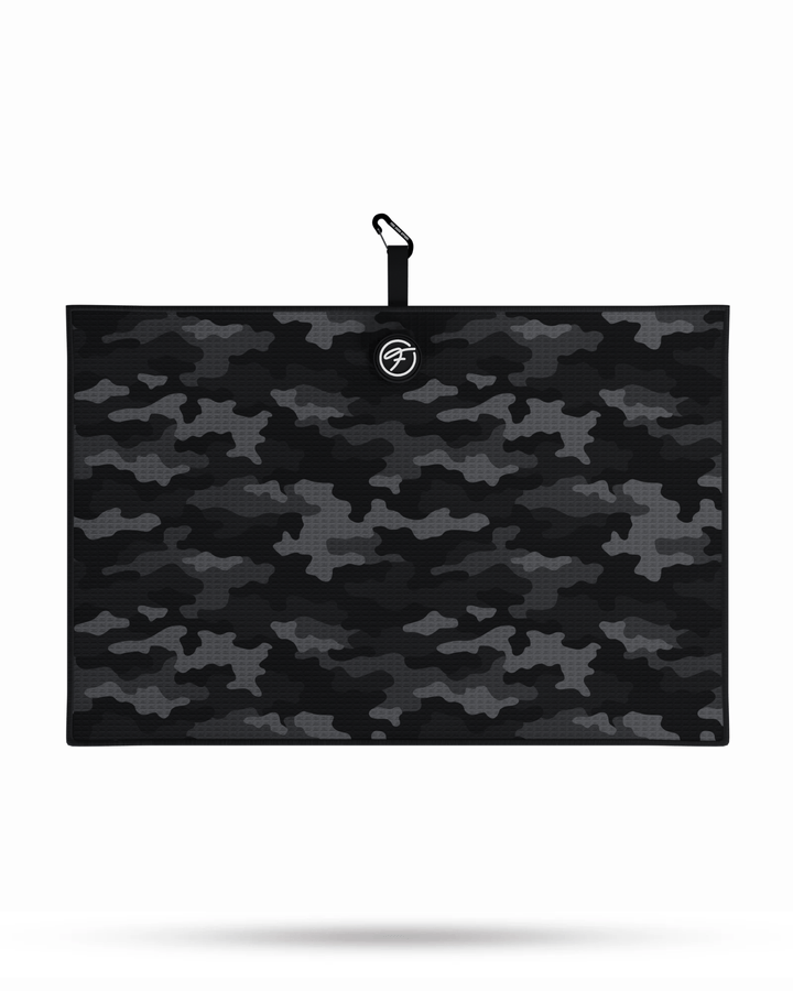 Black Camo Magnetic Golf Towel laid flat, showcasing bold camo design and durable waffle weave microfiber. #color_black-camo